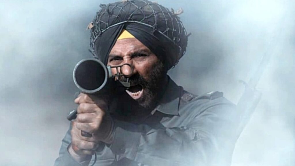 A man in traditional Sikh attire aiming a gun, with a serious expression and smoky background.