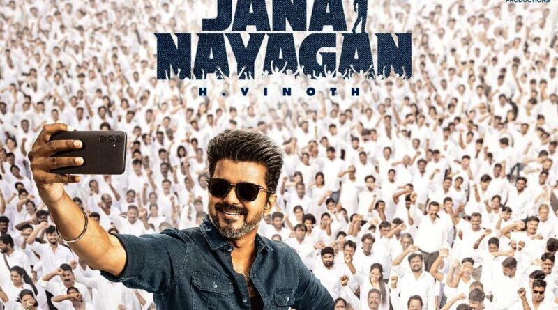 Bright man taking selfie with a large crowd in the background, promoting Jana Nayagan movie.