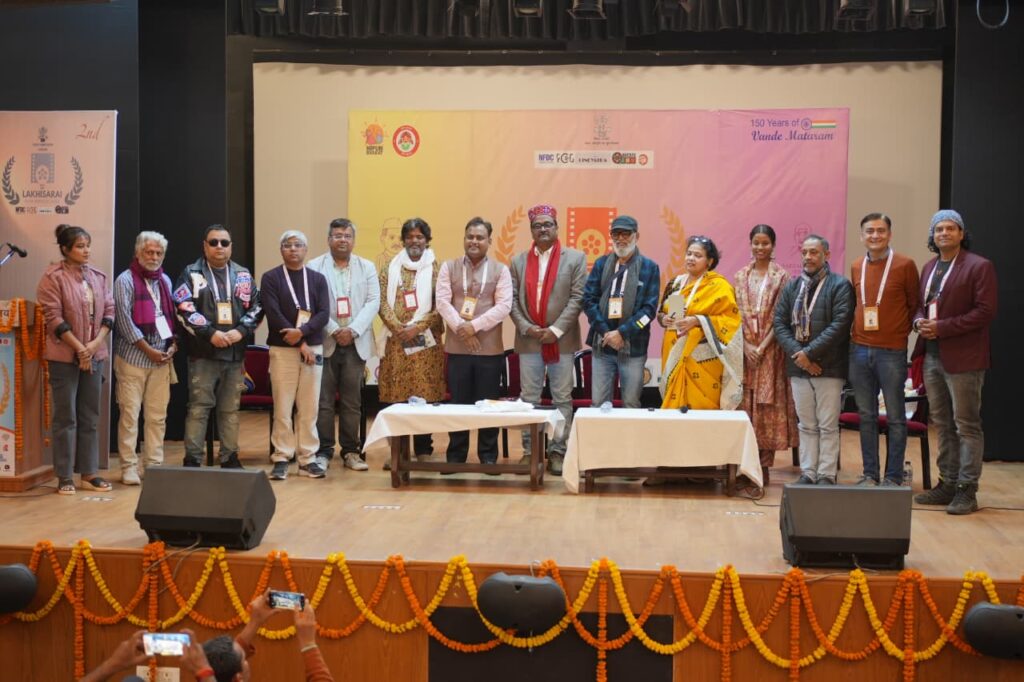 Group of professionals on stage at Soochna Tantra event in India.