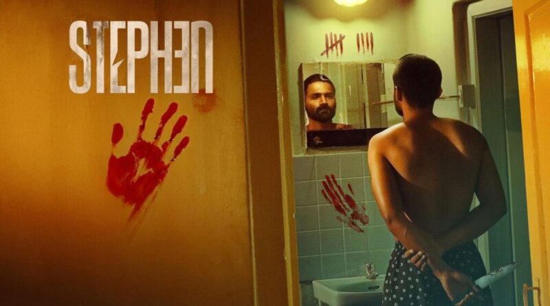 A woman looking at himself in the mirror in a bathroom with "Soochna Tantra" branding and red handpr.