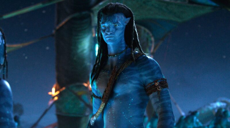 Blue-skinned alien character from the movie Avatar in a mystical forest setting.
