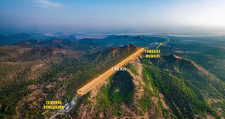 Aerial view of a mountain with a marked route towards Mumbai and Ahmedabad.